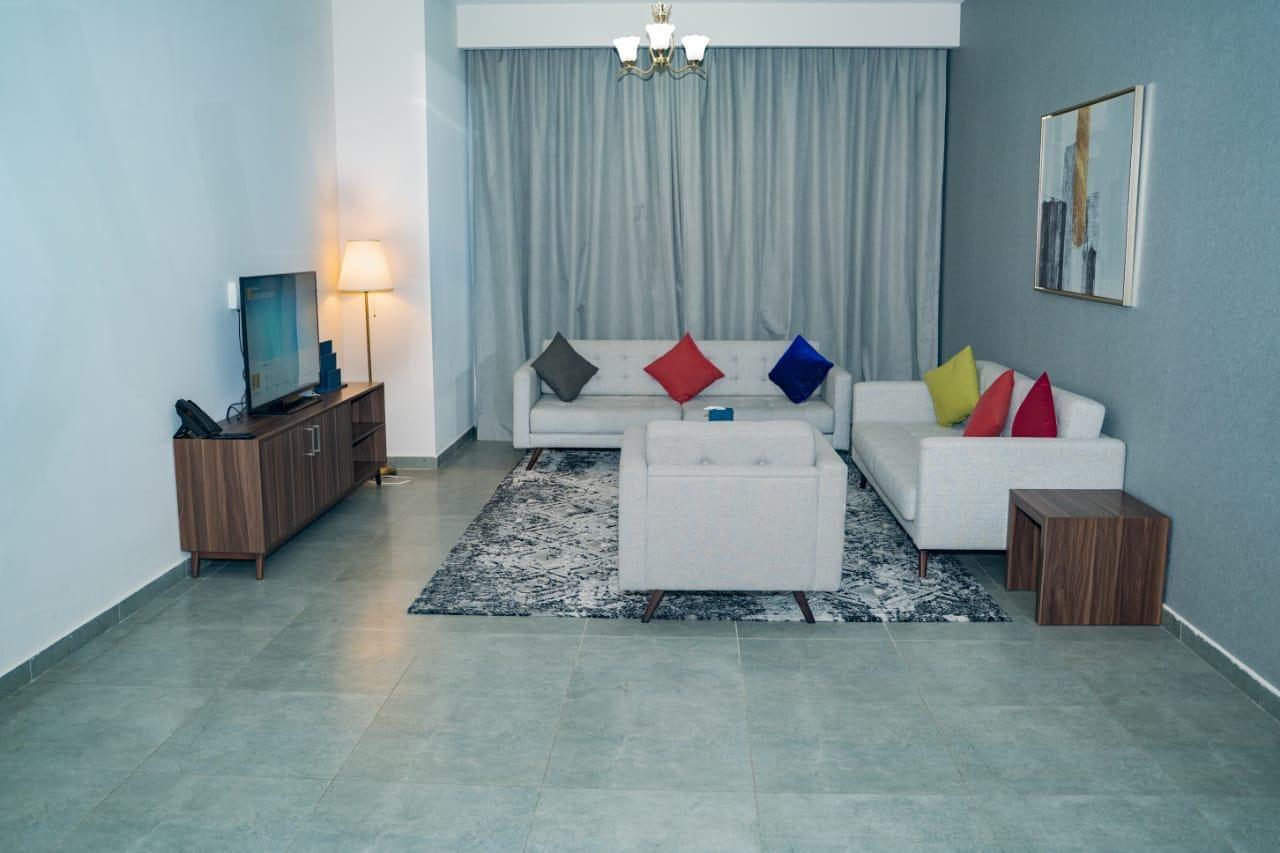 שארג'ה Luxe Grand Hotel Apartments מראה חיצוני תמונה A living room